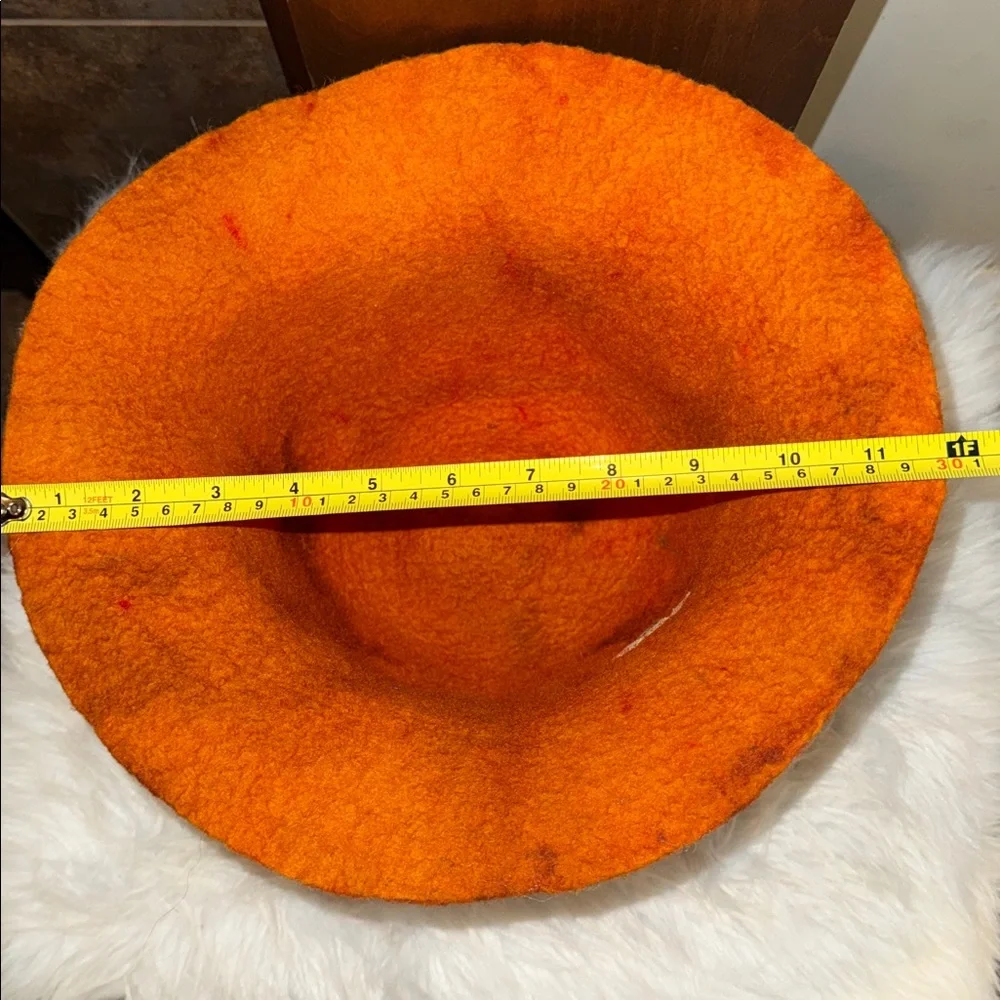 Camilla Krueger Designs orange marbled artisan hand-felted wool sculptural hat